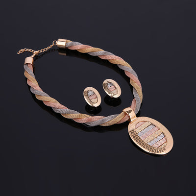 Four-piece jewelry set with tri-color braided necklace, earrings, bracelet, and ring. Each piece features an oval design with a Greek key border and striped gol - Image 8
