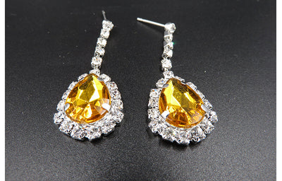 Bridal jewelry set with a silver-tone necklace and matching drop earrings, featuring orange teardrop rhinestones. - Image 6