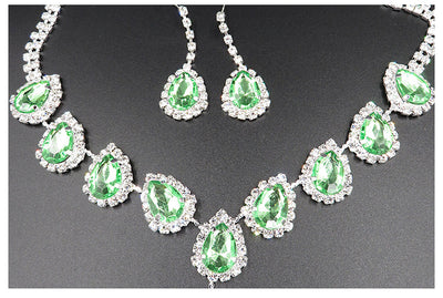 Bridal jewelry set with a silver-tone necklace and matching drop earrings, featuring orange teardrop rhinestones. - Image 8