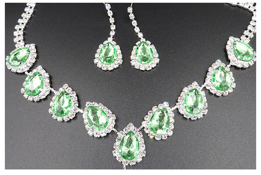 Bridal jewelry set with a silver-tone necklace and matching drop earrings, featuring orange teardrop rhinestones. - Image 8