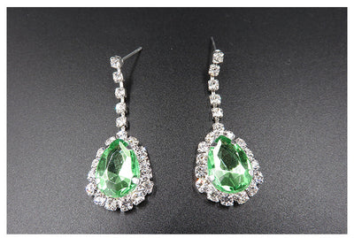 Bridal jewelry set with a silver-tone necklace and matching drop earrings, featuring orange teardrop rhinestones. - Image 10