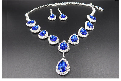 Bridal jewelry set with a silver-tone necklace and matching drop earrings, featuring orange teardrop rhinestones. - Image 11