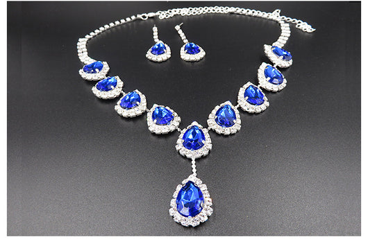 Bridal jewelry set with a silver-tone necklace and matching drop earrings, featuring orange teardrop rhinestones. - Image 11