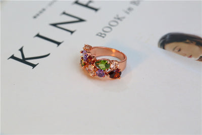 Shiny rose gold-tone necklace, earrings, and ring set with multi-colored teardrop and round zircon stones. Ring size 9. - Image 11