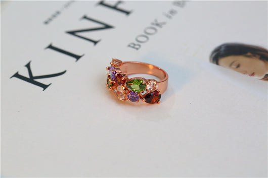 Shiny rose gold-tone necklace, earrings, and ring set with multi-colored teardrop and round zircon stones. Ring size 9. - Image 11