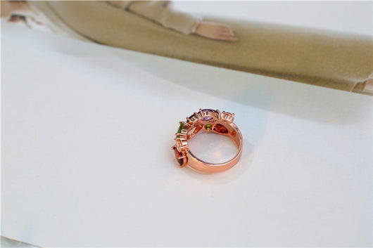 Shiny rose gold-tone necklace, earrings, and ring set with multi-colored teardrop and round zircon stones. Ring size 9. - Image 13