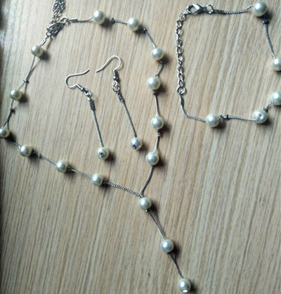 Conjunto de Joyería Perla Elegante: Collar, Aretes y Pulsera - Image 11
