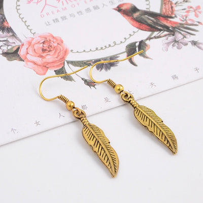 Aretes de Cristal Vintage con Colgante de Hoja - Image 10