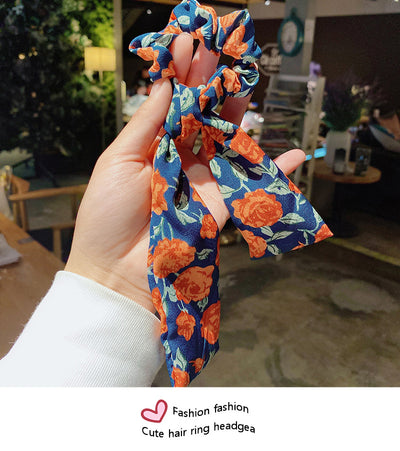 Moño Perla con Lazo Floral - Goma Elástica para Cabello Elegante - Image 8