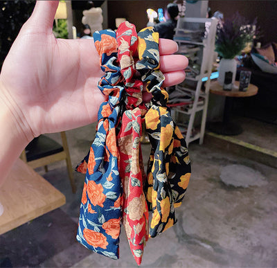 Moño Perla con Lazo Floral - Goma Elástica para Cabello Elegante - Image 9