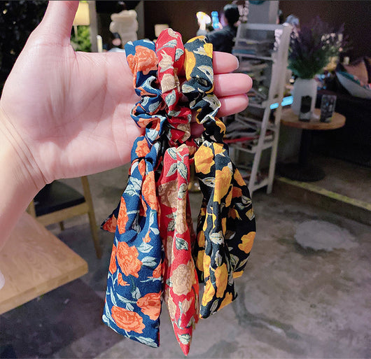 Moño Perla con Lazo Floral - Goma Elástica para Cabello Elegante - Image 9