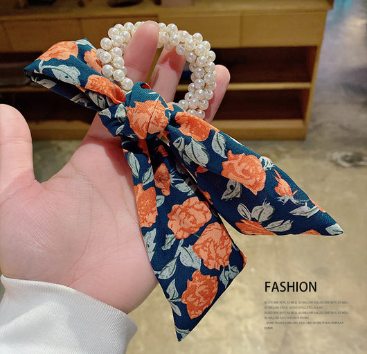 Moño Perla con Lazo Floral - Goma Elástica para Cabello Elegante - Image 13