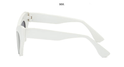 Red cat-eye sunglasses with silver mirrored lenses, featuring a bold retro frame design. - Image 9