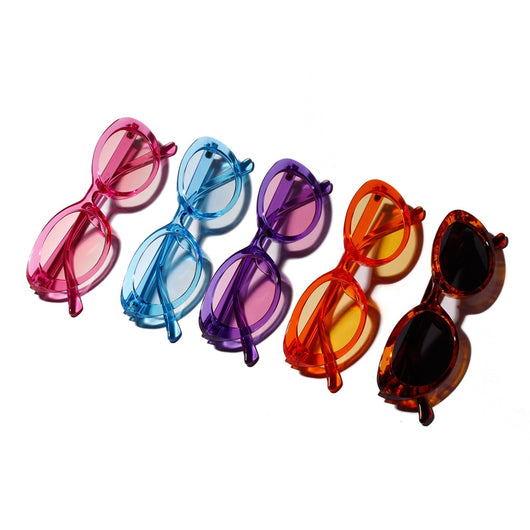 Translucent blue small frame oval sunglasses with light blue lenses on a white background. - Image 5