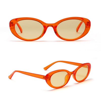 Translucent blue small frame oval sunglasses with light blue lenses on a white background. - Image 7