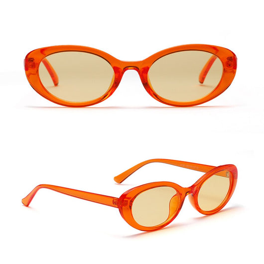 Translucent blue small frame oval sunglasses with light blue lenses on a white background. - Image 7