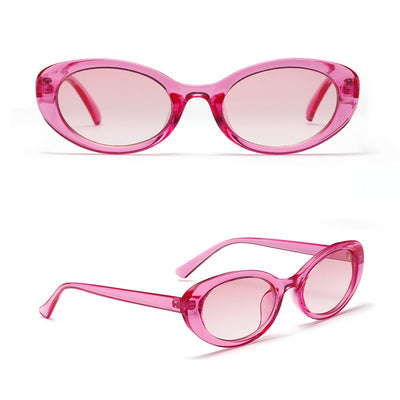 Translucent blue small frame oval sunglasses with light blue lenses on a white background. - Image 10