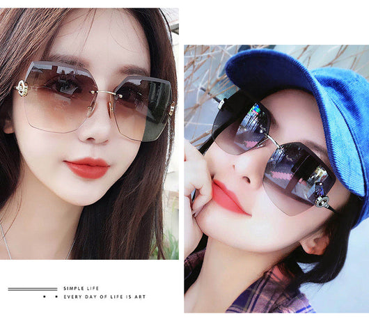 Woman wearing oversized hexagonal rimless sunglasses with gradient lenses and a black leather newsboy cap. - Image 14