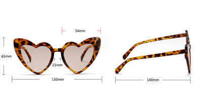 Heart-shaped tortoiseshell sunglasses with light brown lenses on a white background, perfect for women. - Image 9