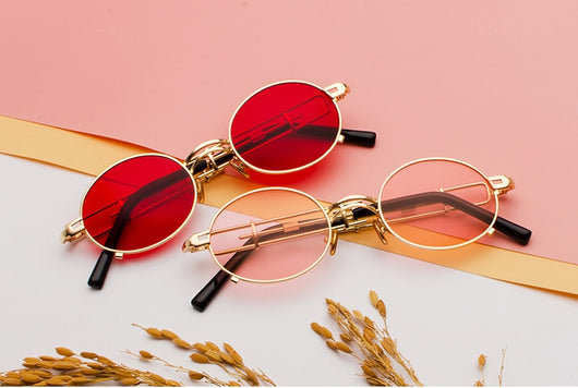 Black individual steampunk sunglasses with round clear lenses and unique metal frames on a white background. - Image 4