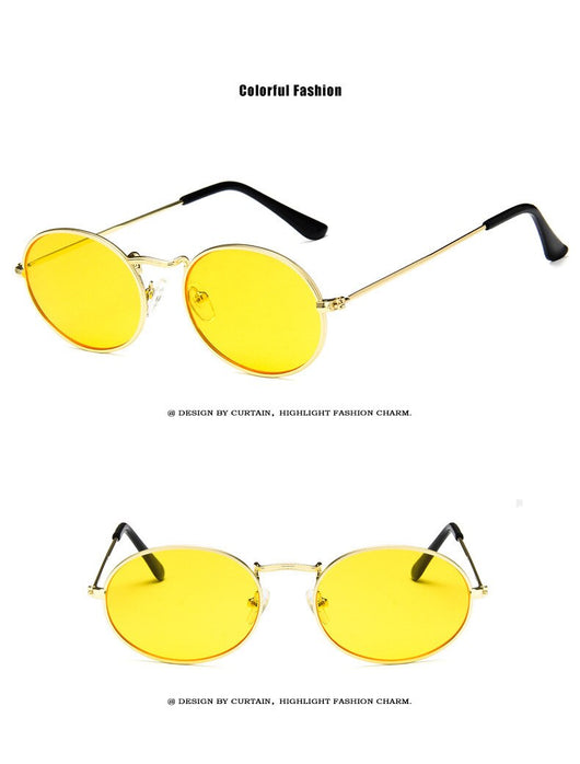 Retro round sunglasses with pink lenses and a gold-colored metal frame, featuring black ear tips. - Image 17
