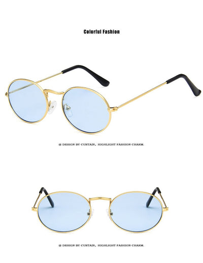 Retro round sunglasses with pink lenses and a gold-colored metal frame, featuring black ear tips. - Image 20