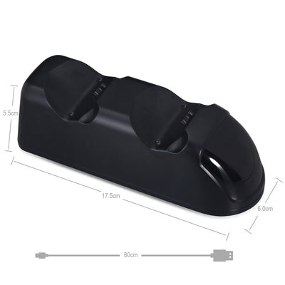 Black dual charging dock for PS4 wireless controllers with green LED indicators, shown with its retail box and USB cable. - Image 8