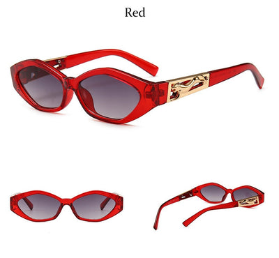Angular cat-eye sunglasses with a tortoiseshell frame, brown gradient lenses, and gold jumping cheetah temple details. - Image 29
