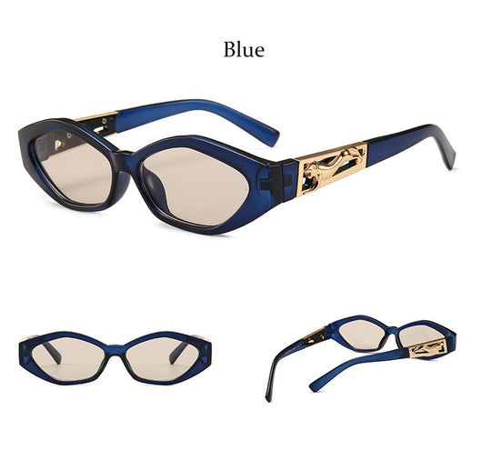 Angular cat-eye sunglasses with a tortoiseshell frame, brown gradient lenses, and gold jumping cheetah temple details. - Image 31