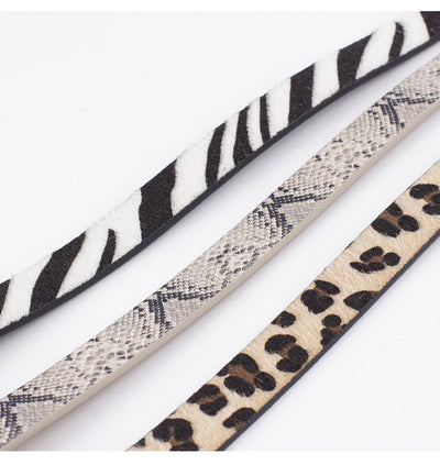 Women's zebra print fashion belt with black and white stripes and a round gold-tone buckle. - Image 19