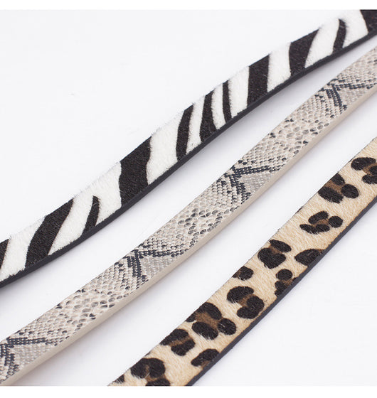 Women's zebra print fashion belt with black and white stripes and a round gold-tone buckle. - Image 19