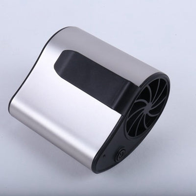 Close-up of a finger pressing the power button on a silver-grey portable waist fan with a black fan grill. - Image 15