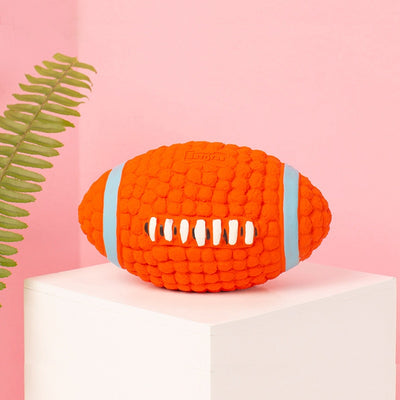 Orange textured latex dog toy shaped like an American football with blue and white accents, measuring 14cm long and 8cm wide. - Image 8