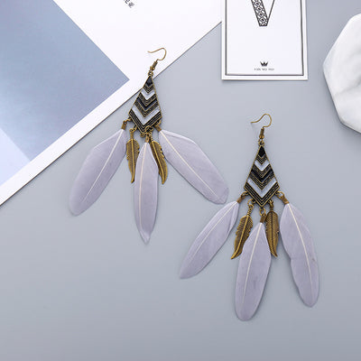 Aretes Bohemios de Hoja Diamante con Borla y Pluma para Mujer - Image 17
