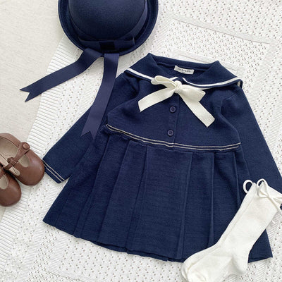Vestido Colegial Plisado Azul Marino con Cuello Tejido - Image 6