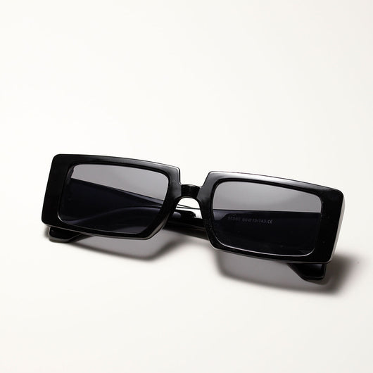 Cool black super retro sunglasses with rectangular frames and dark lenses, displayed on a white background. - Image 11