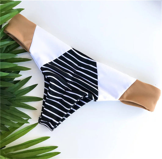Striped printed split triangle female swimsuit with bandeau top and color block bottom on white background. - Image 6