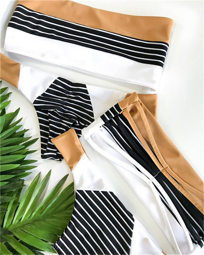 Striped printed split triangle female swimsuit with bandeau top and color block bottom on white background. - Image 8