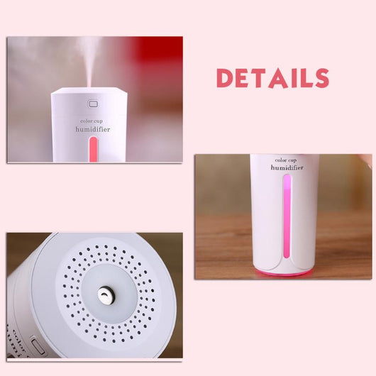 White mini USB ultrasonic humidifier with a green LED light strip, emitting mist, on a white surface. - Image 12