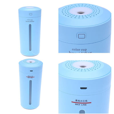 White mini USB ultrasonic humidifier with a green LED light strip, emitting mist, on a white surface. - Image 18