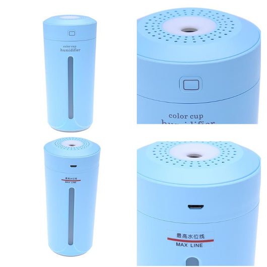White mini USB ultrasonic humidifier with a green LED light strip, emitting mist, on a white surface. - Image 18