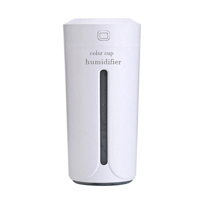 White mini USB ultrasonic humidifier with a green LED light strip, emitting mist, on a white surface. - Image 20