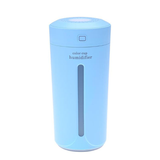 White mini USB ultrasonic humidifier with a green LED light strip, emitting mist, on a white surface. - Image 25