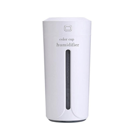 White mini USB ultrasonic humidifier with a green LED light strip, emitting mist, on a white surface. - Image 26