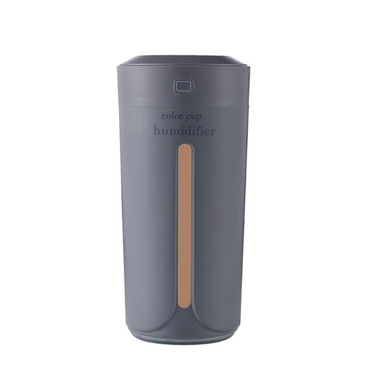 White mini USB ultrasonic humidifier with a green LED light strip, emitting mist, on a white surface. - Image 27
