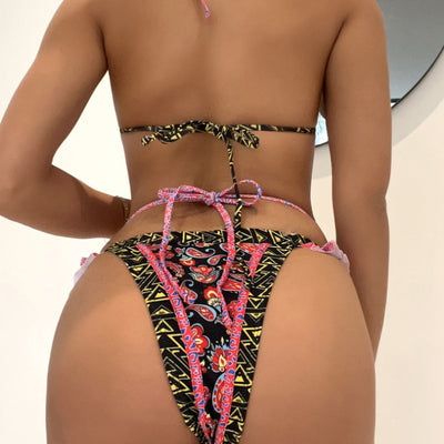 Teal bohemian print bikini with halter neck top, ruffled edges, and high-cut bottom with side straps. - Image 9