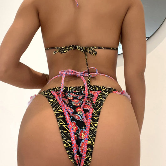 Teal bohemian print bikini with halter neck top, ruffled edges, and high-cut bottom with side straps. - Image 9