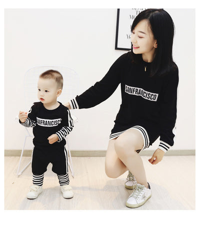 Black sweater suit with white stripes on sleeves and hem, featuring mirrored "SAN FRANCISCO" text on the chest. - Image 11