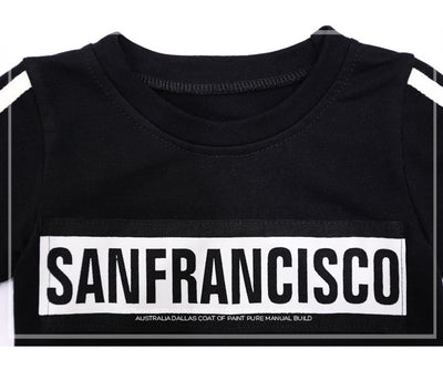 Black sweater suit with white stripes on sleeves and hem, featuring mirrored "SAN FRANCISCO" text on the chest. - Image 18
