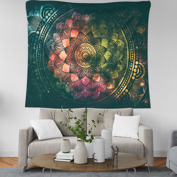 Vibrant mandala galaxy tapestry wall hanging with colorful geometric abstract pattern, displayed above a sofa.